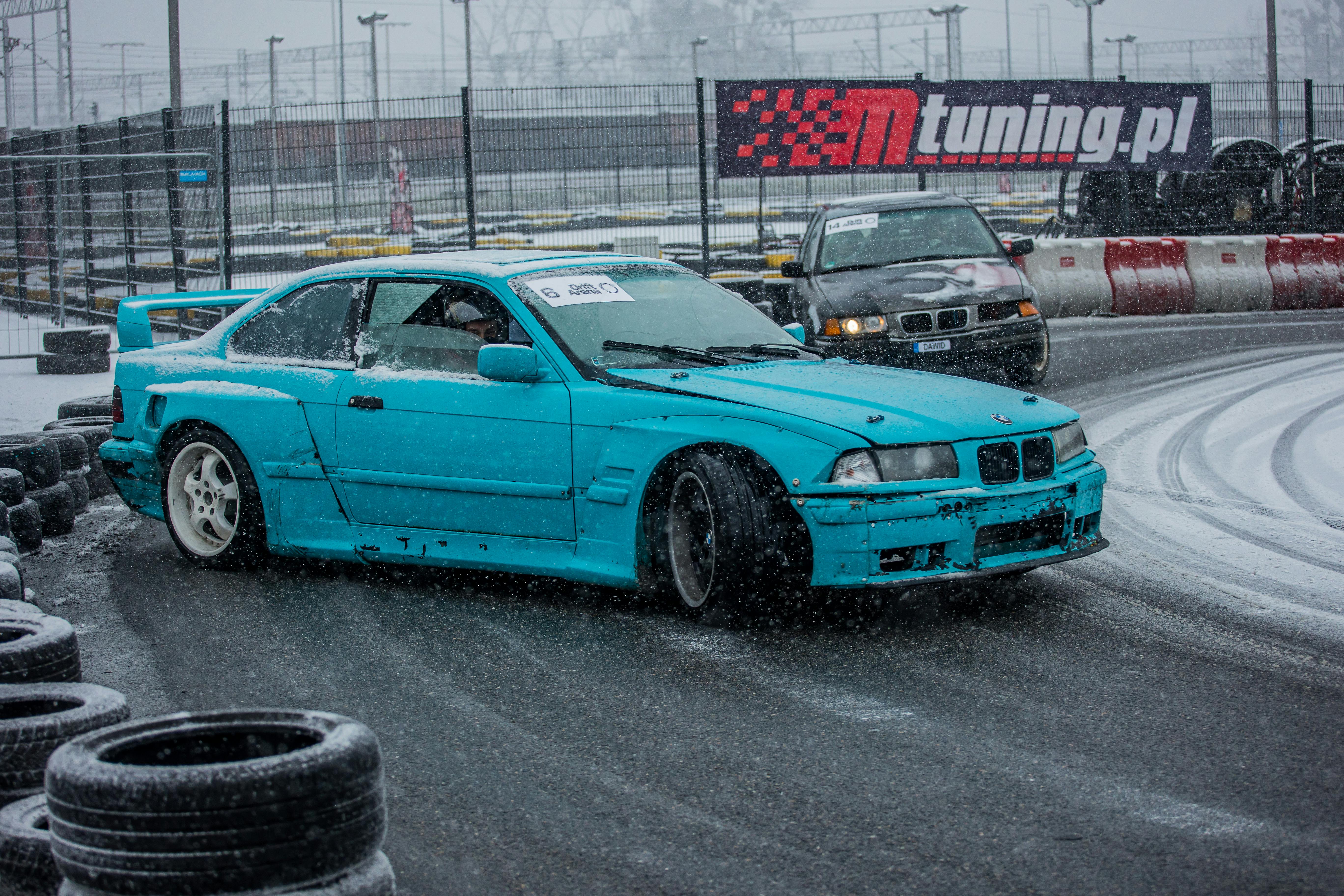 Cars drifting in snow